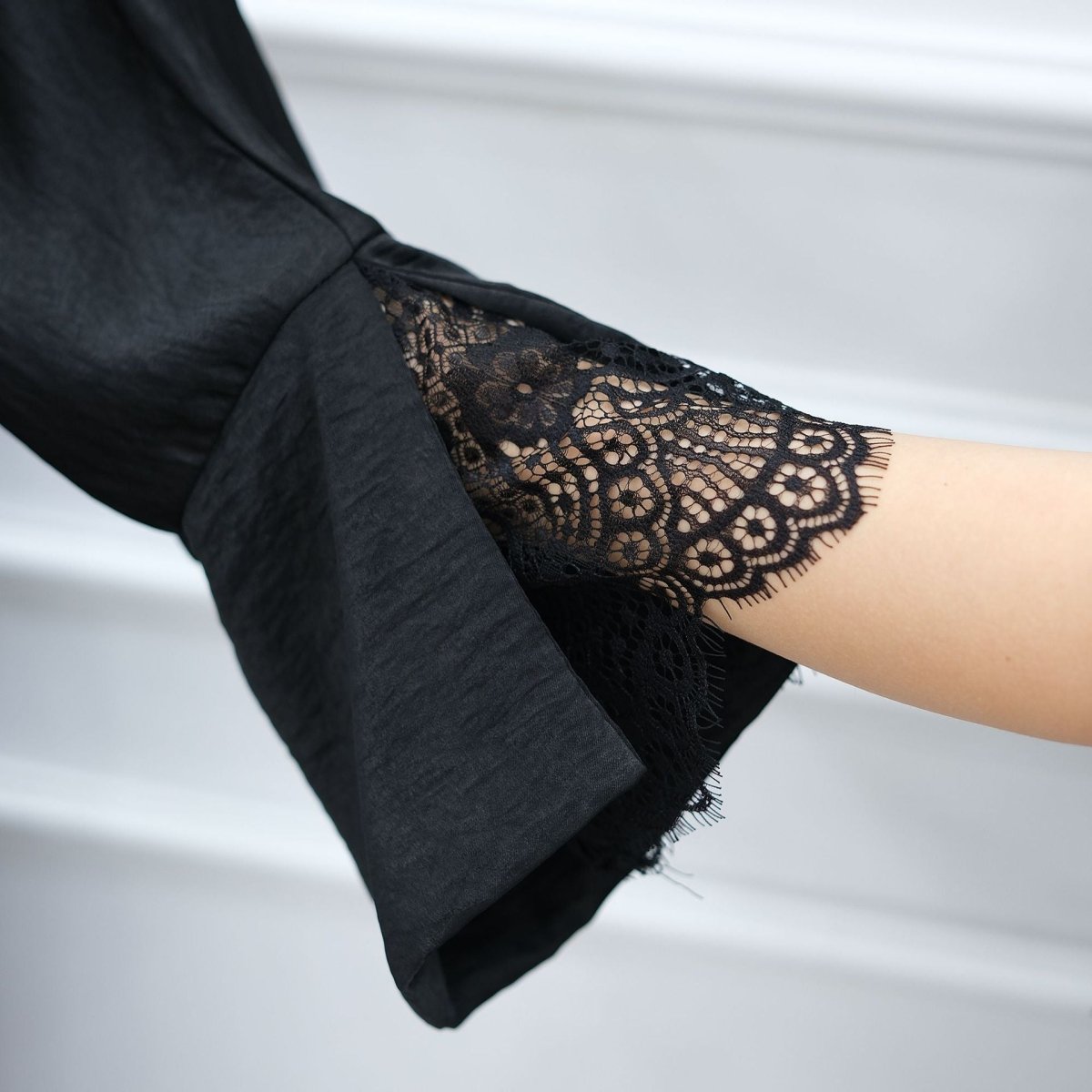 Draped sleeve movement of lightweight crinkle abaya