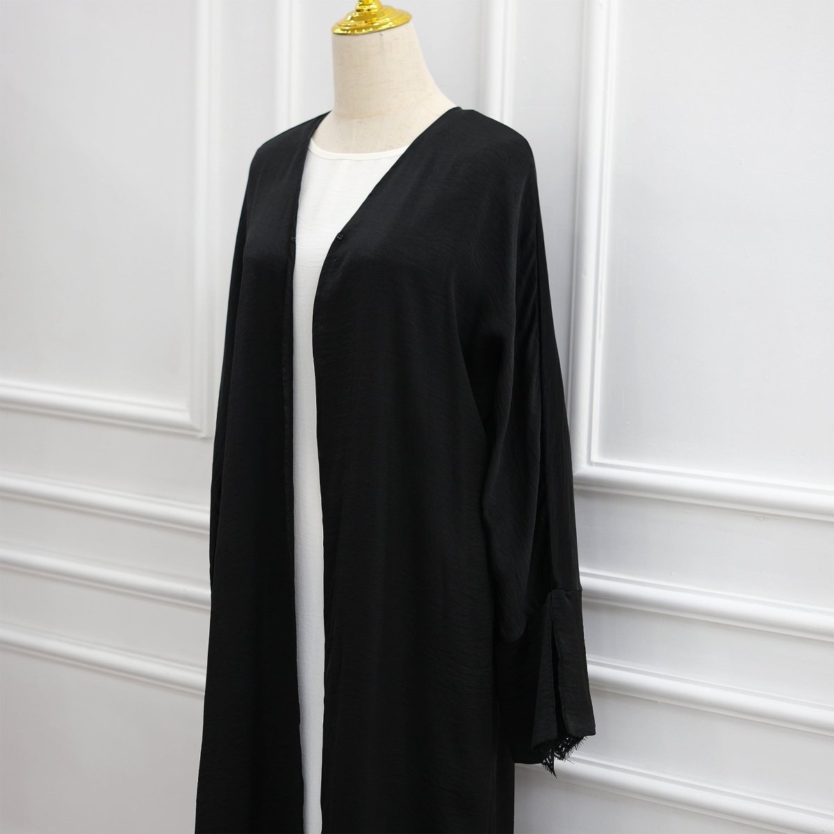 Styled outfit shot with tonal lace cuff abaya