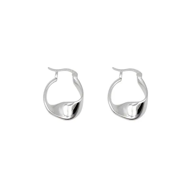 MAC063 Filled Twisted Ear Buckle Earrings - Mariam's Collection