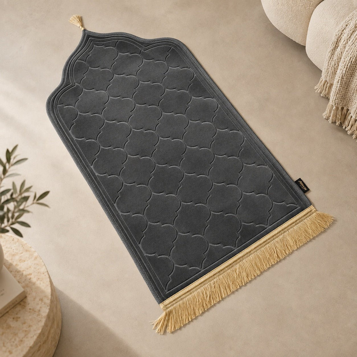 Plush flannel pile texture of cushioned prayer mat