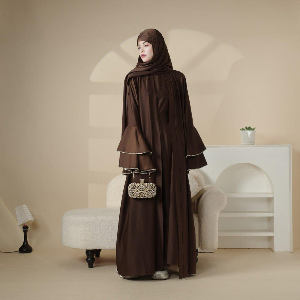 Crepe abaya with puffy sleeves and tassel neck rope main image 1
