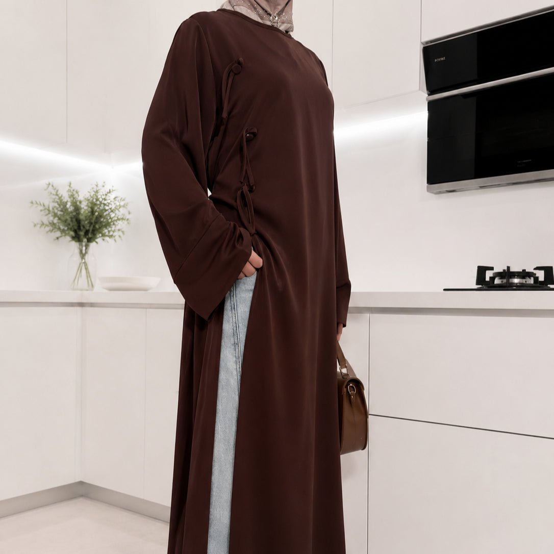 Full-length front view of longline Nida top with drawstring loosely hanging