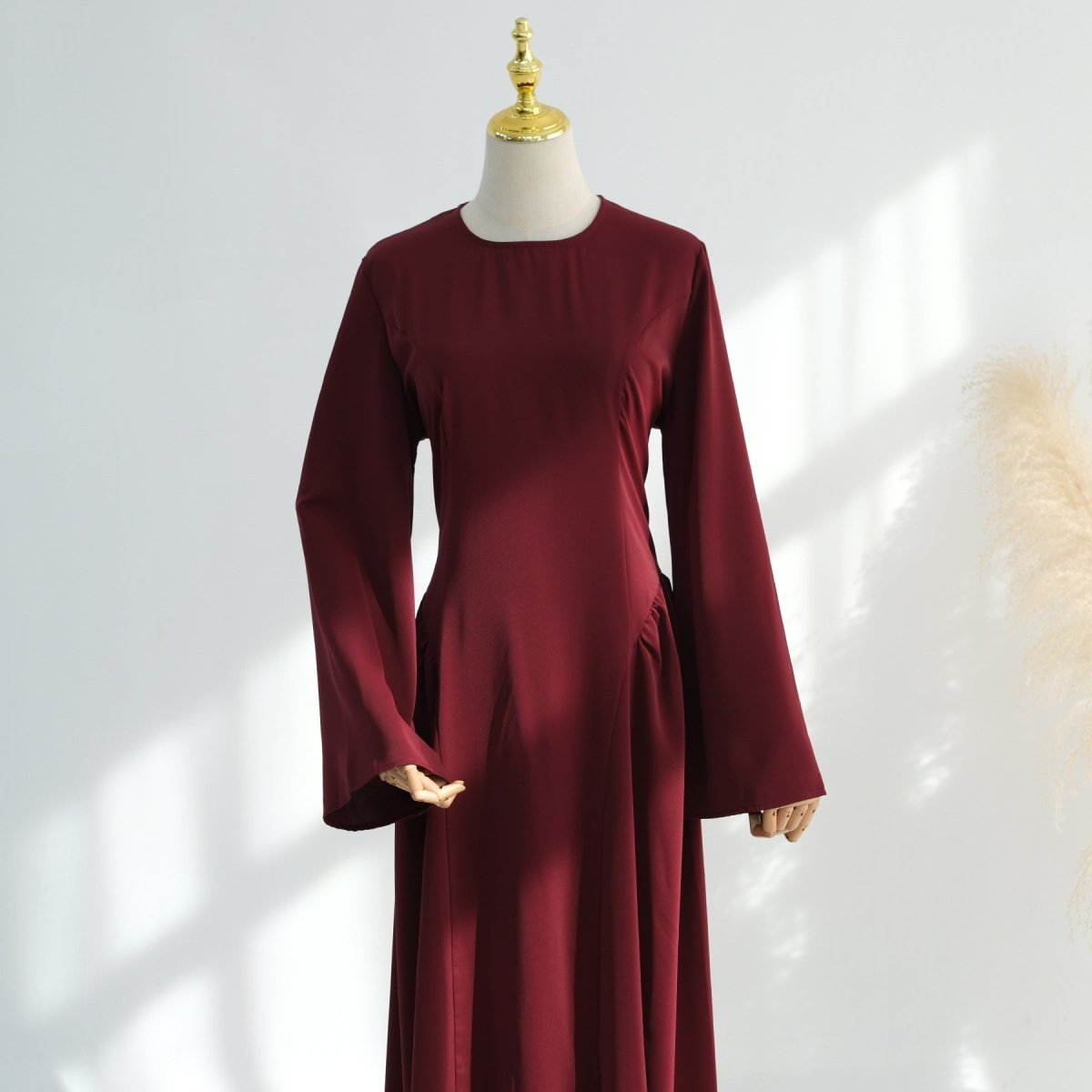 Wide flared bell sleeves close-up on modest nida abaya dress