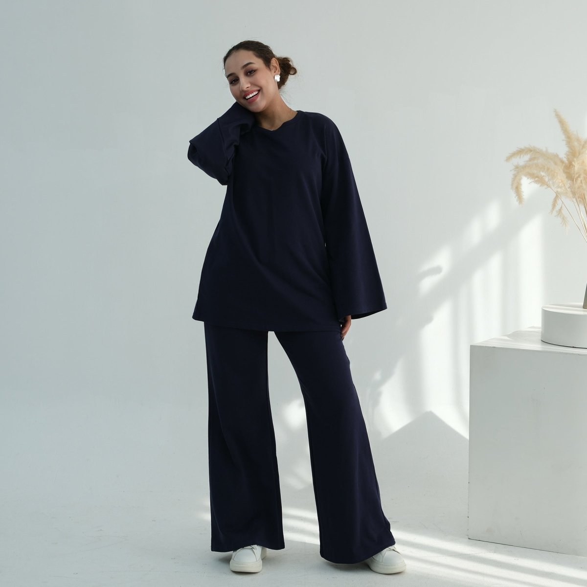 Round neckline detail of oversized cotton modest top