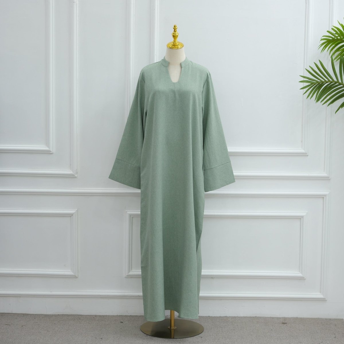 Oversized V - Neck Abaya with Pockets | Solid Color Maxi Dress with Wide Cuffs(MA331) - Mariam's Collection