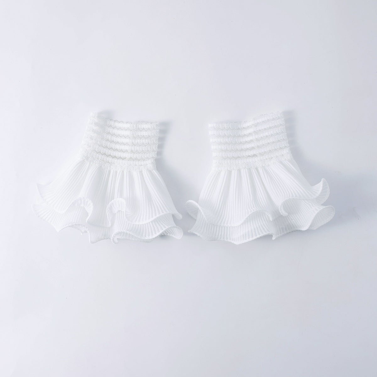 Pearl ruffle cuff sleeves with wide gathered tiers and pearl embellishment