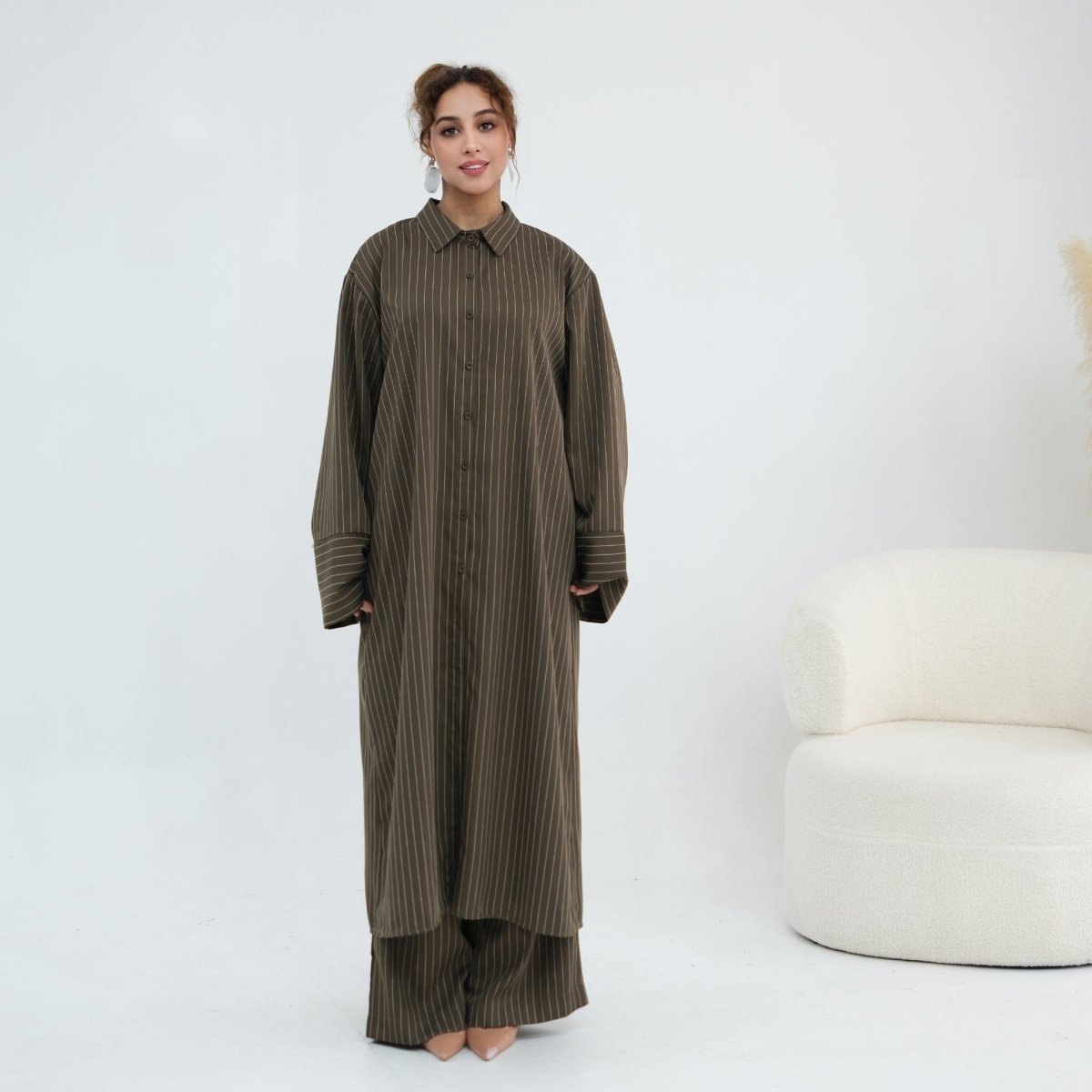 Size reference full-length shot of the pinstripe shirt and wide-leg trouser set