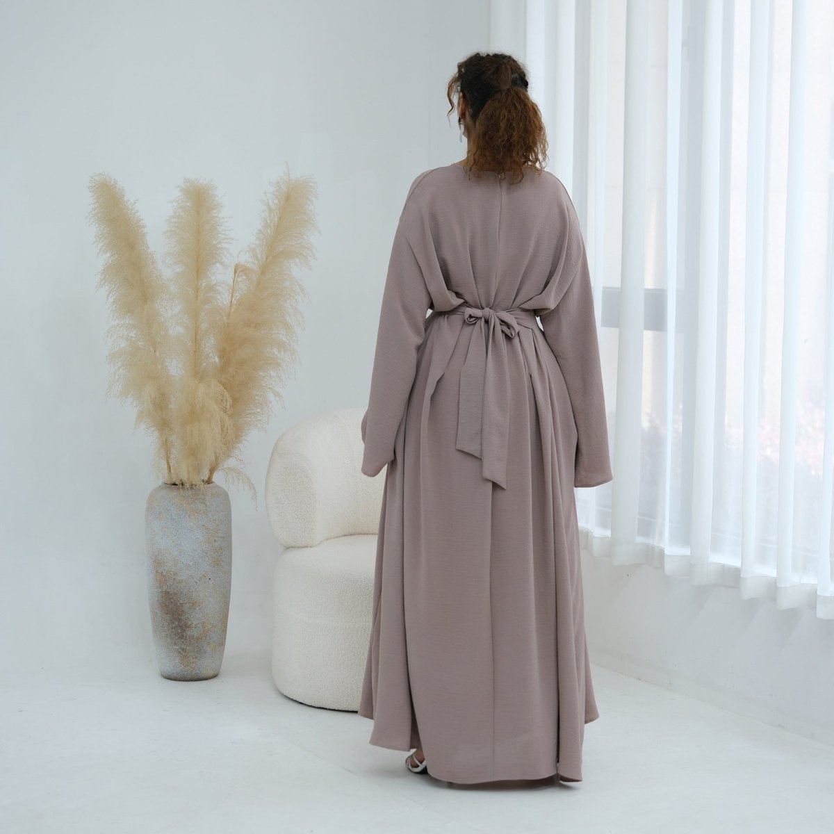 Back view showing hidden zip closure from neckline to hem