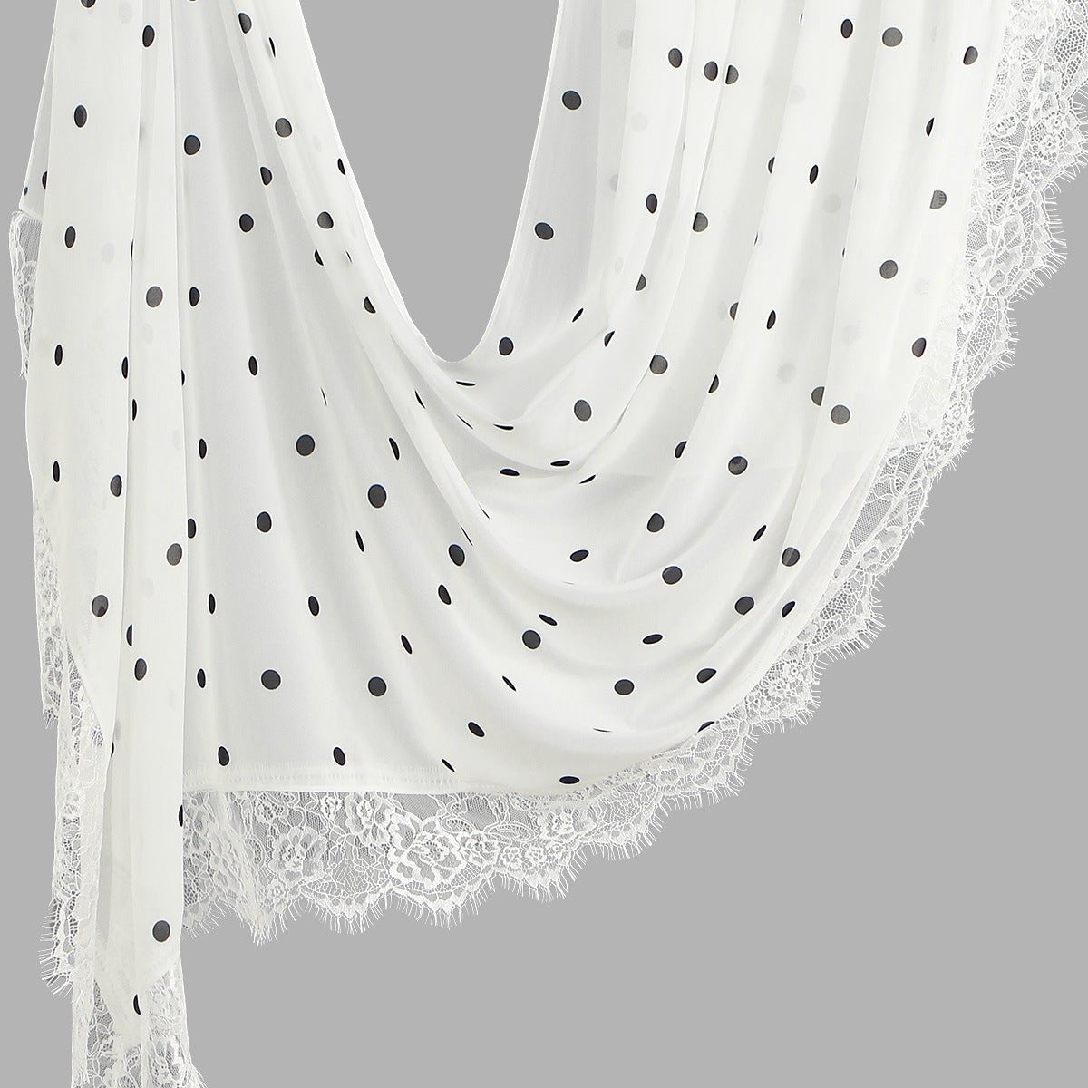 Flat lay of 180×70cm polka dot lace-trim hijab showing full length