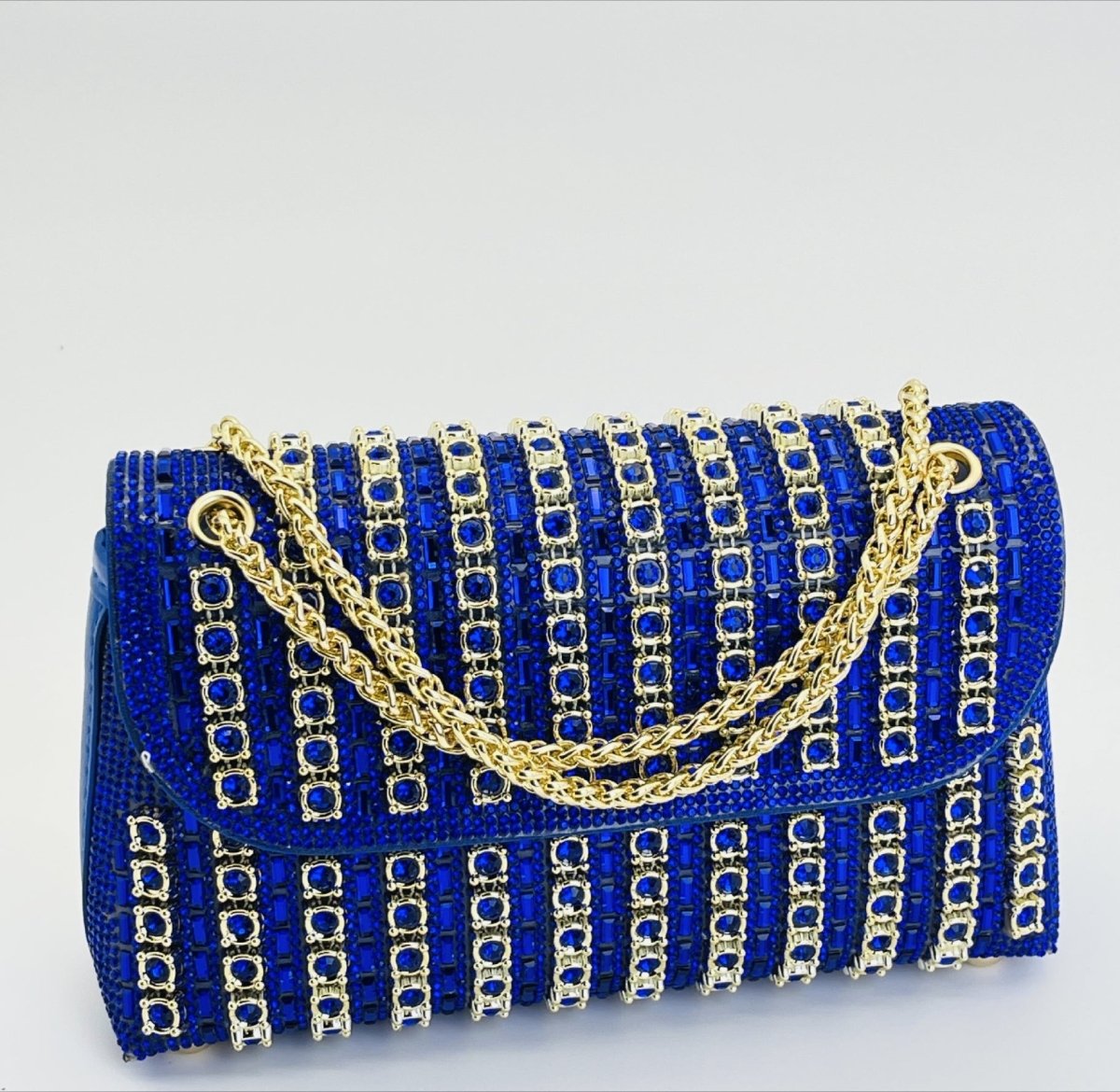 Silver sparkle clutch held in hand for wedding event