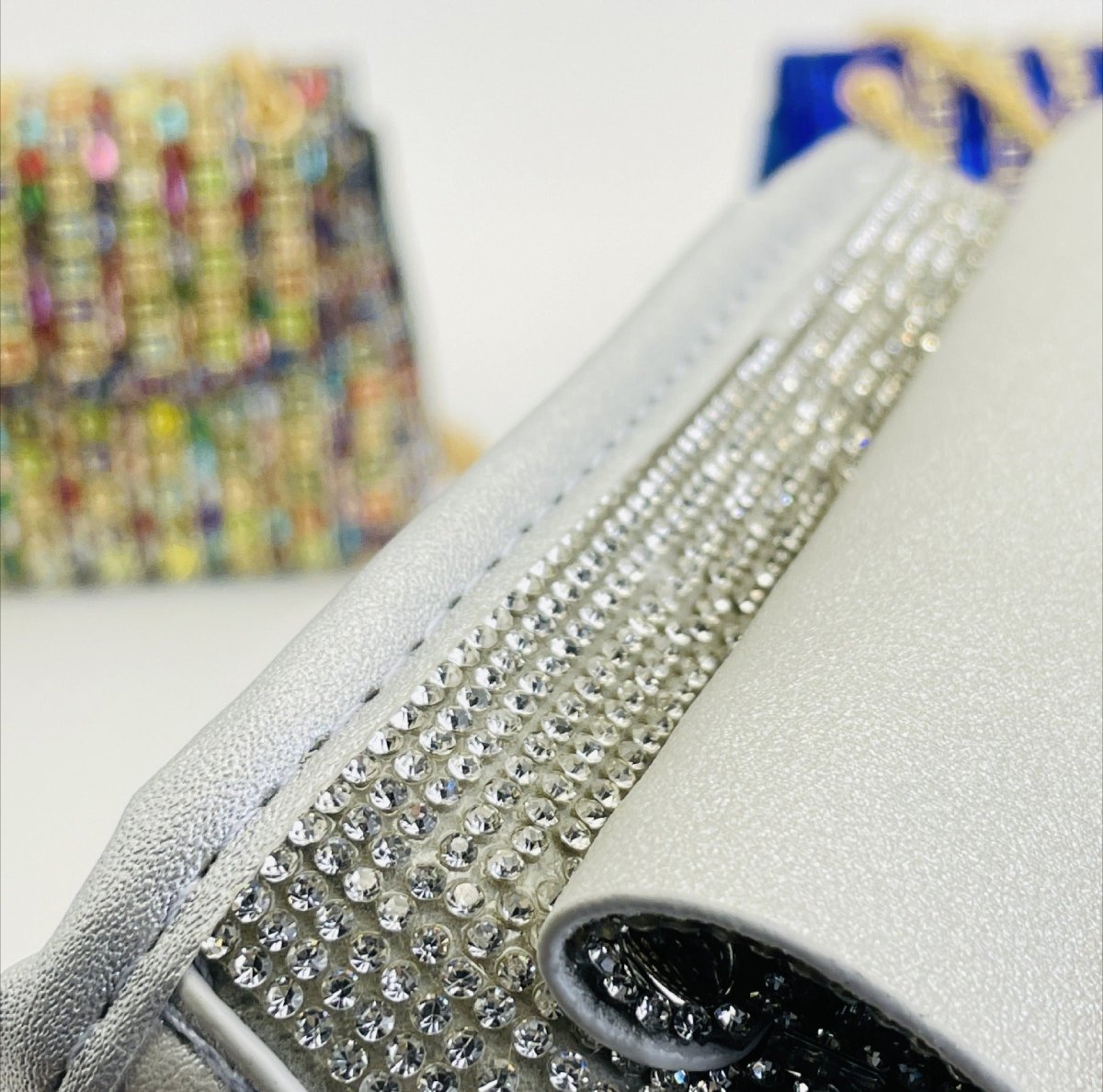 Gold-tone jewelled clutch bag with rhinestones