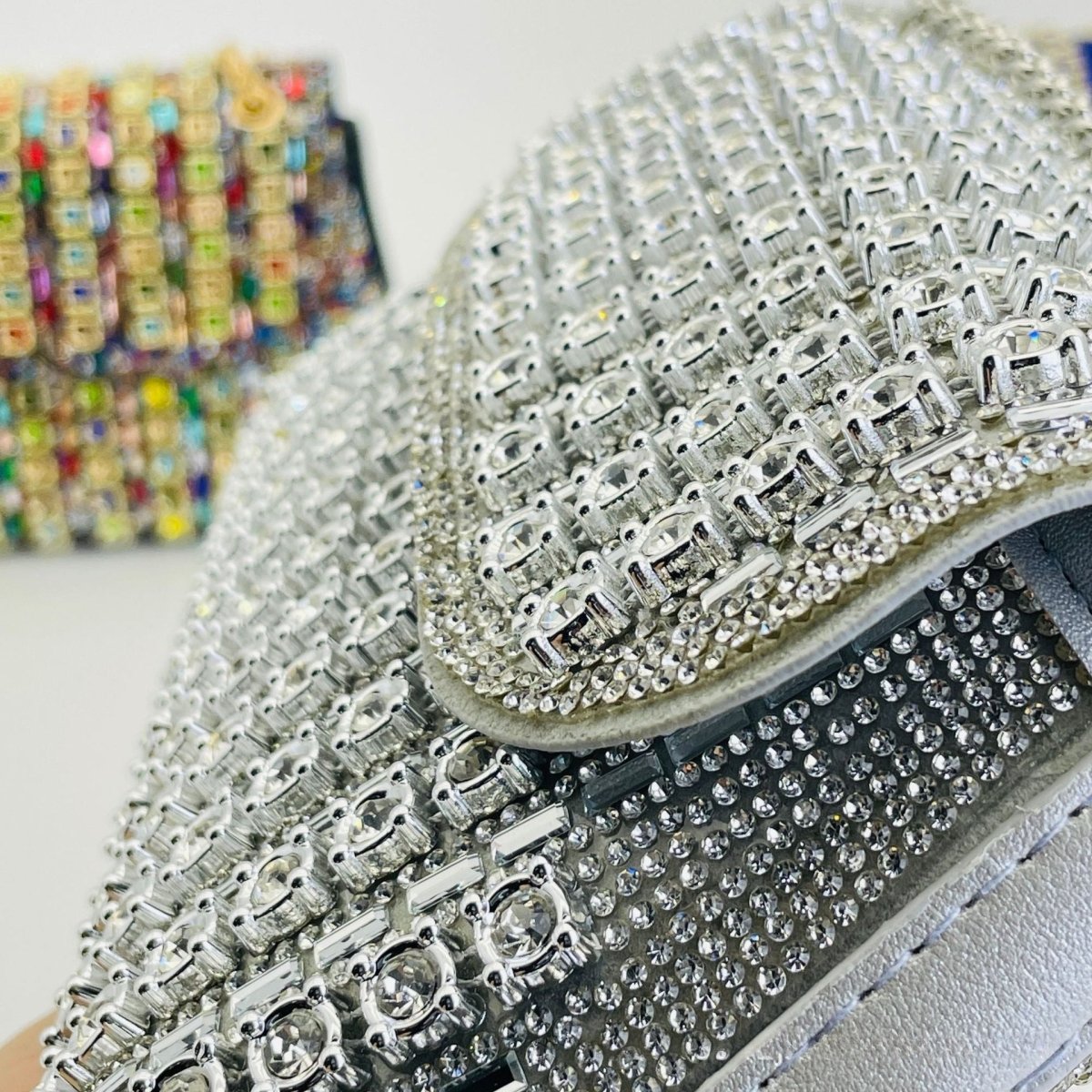 Sparkle clutch bag chain strap detail