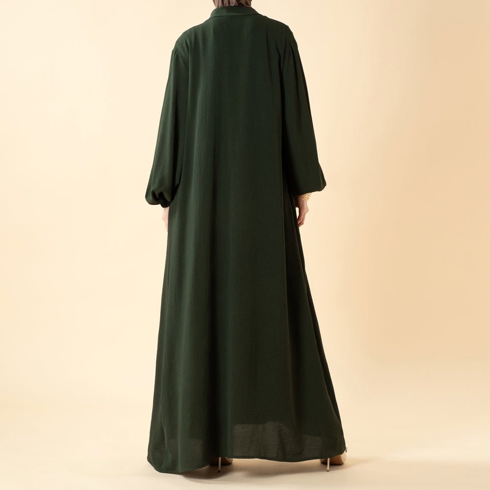 Close-up of abaya neckline and shoulder detail in breathable fabric