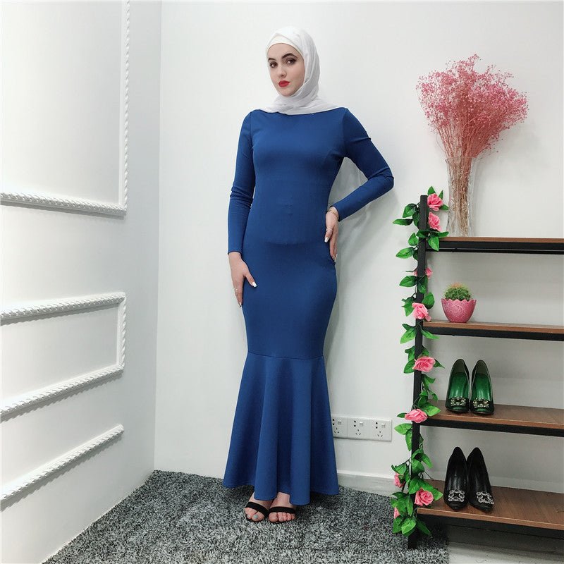 Flowing mermaid skirt flare detail on modest full-length maxi dress
