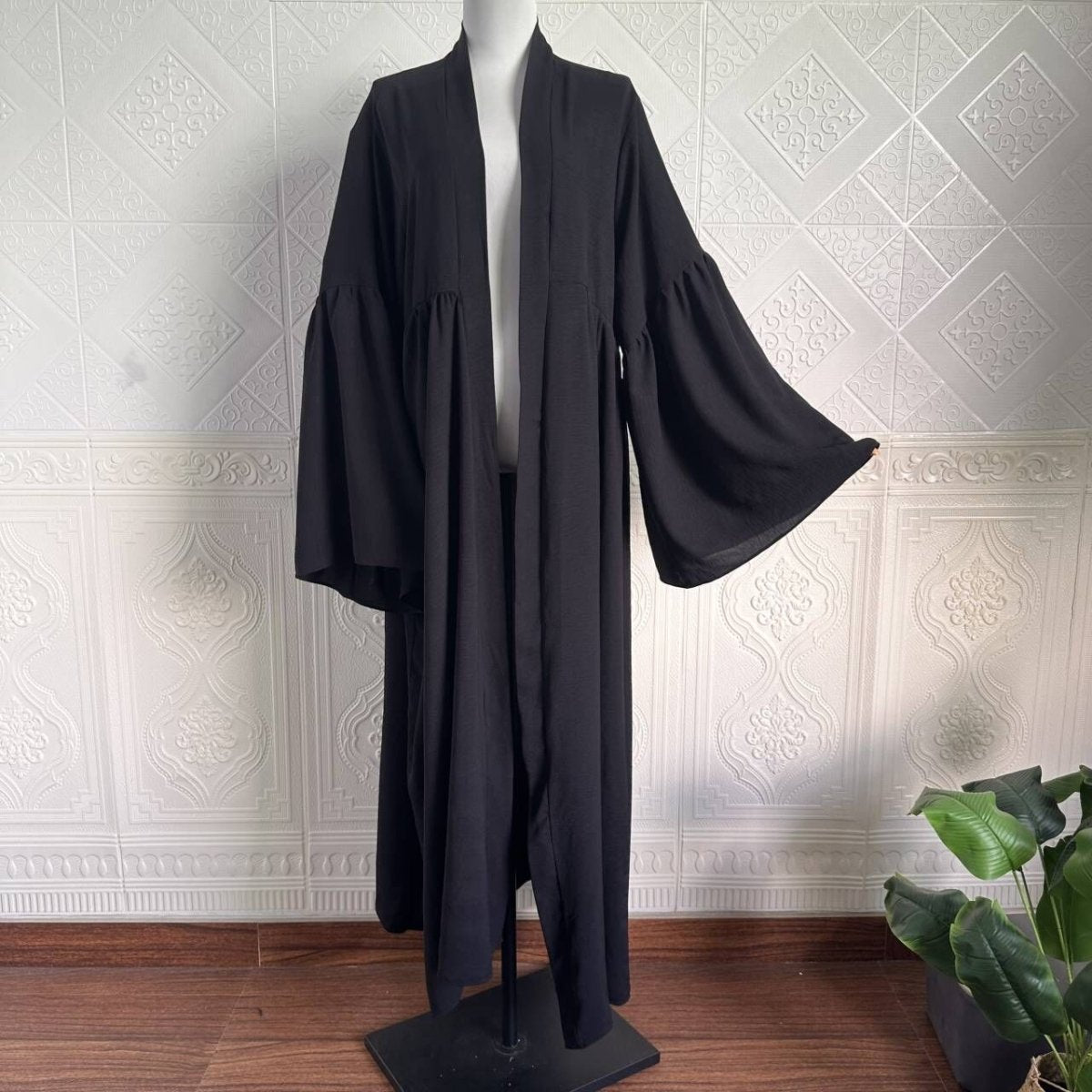 Modest bell sleeve abaya with structured yoke and gathered tiered body