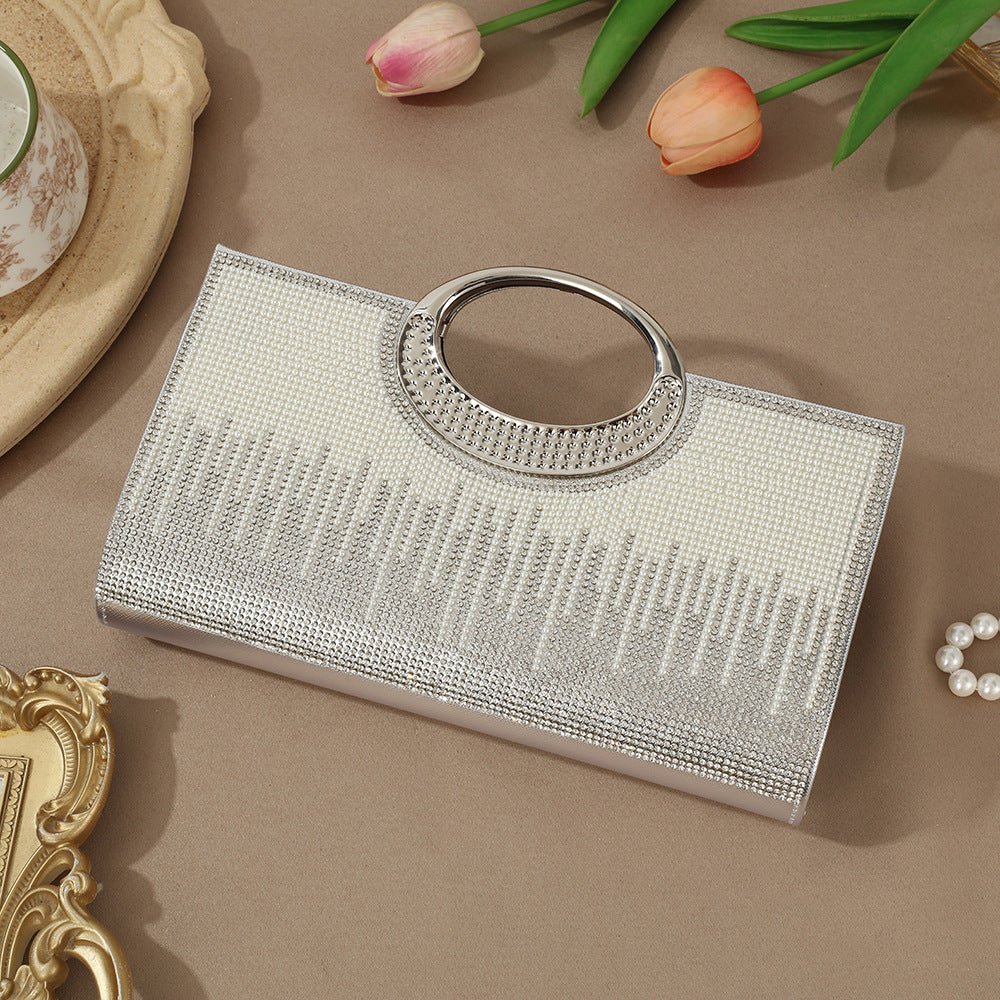 Vintage bridal clutch bag styled alongside satin hijab for formal occasion