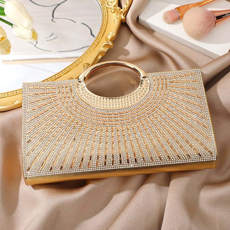 Front view of vintage rhinestone clutch bag with gold circular handle