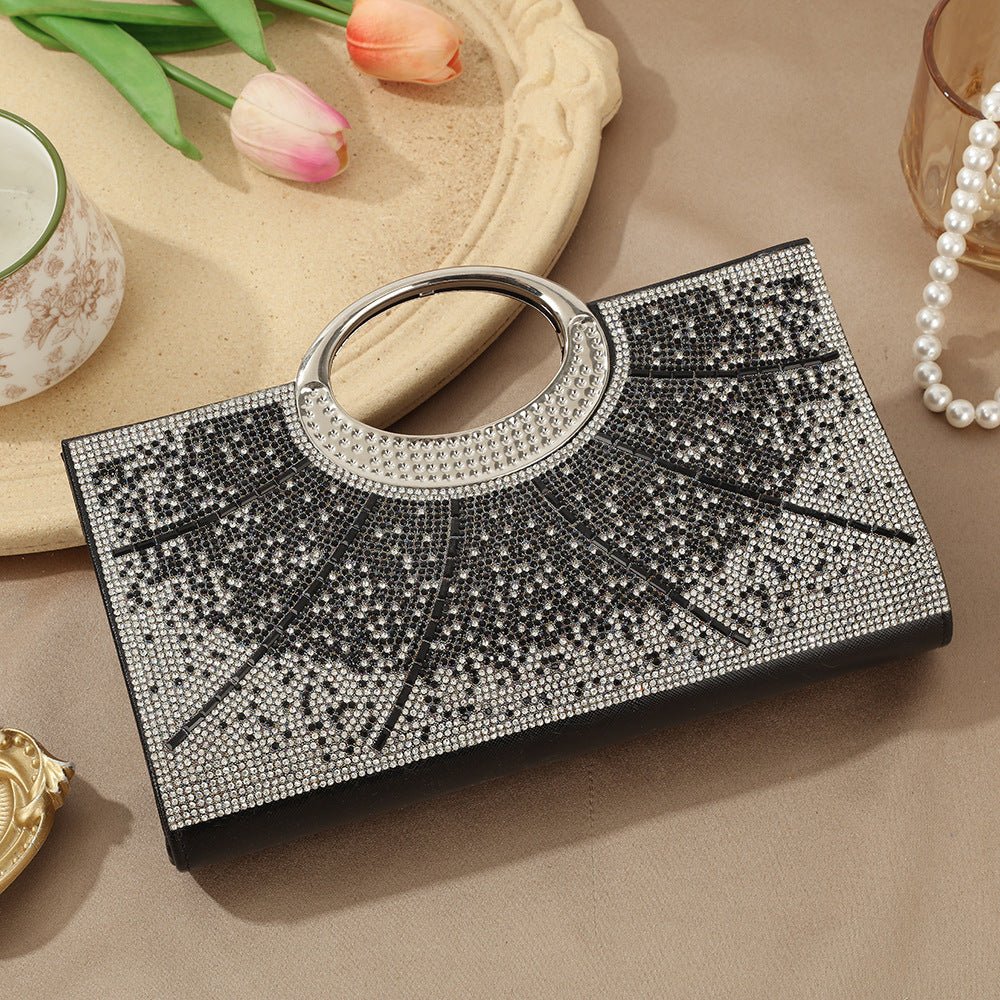 Vintage clutch bag catching light from multiple angles showing sparkle effect