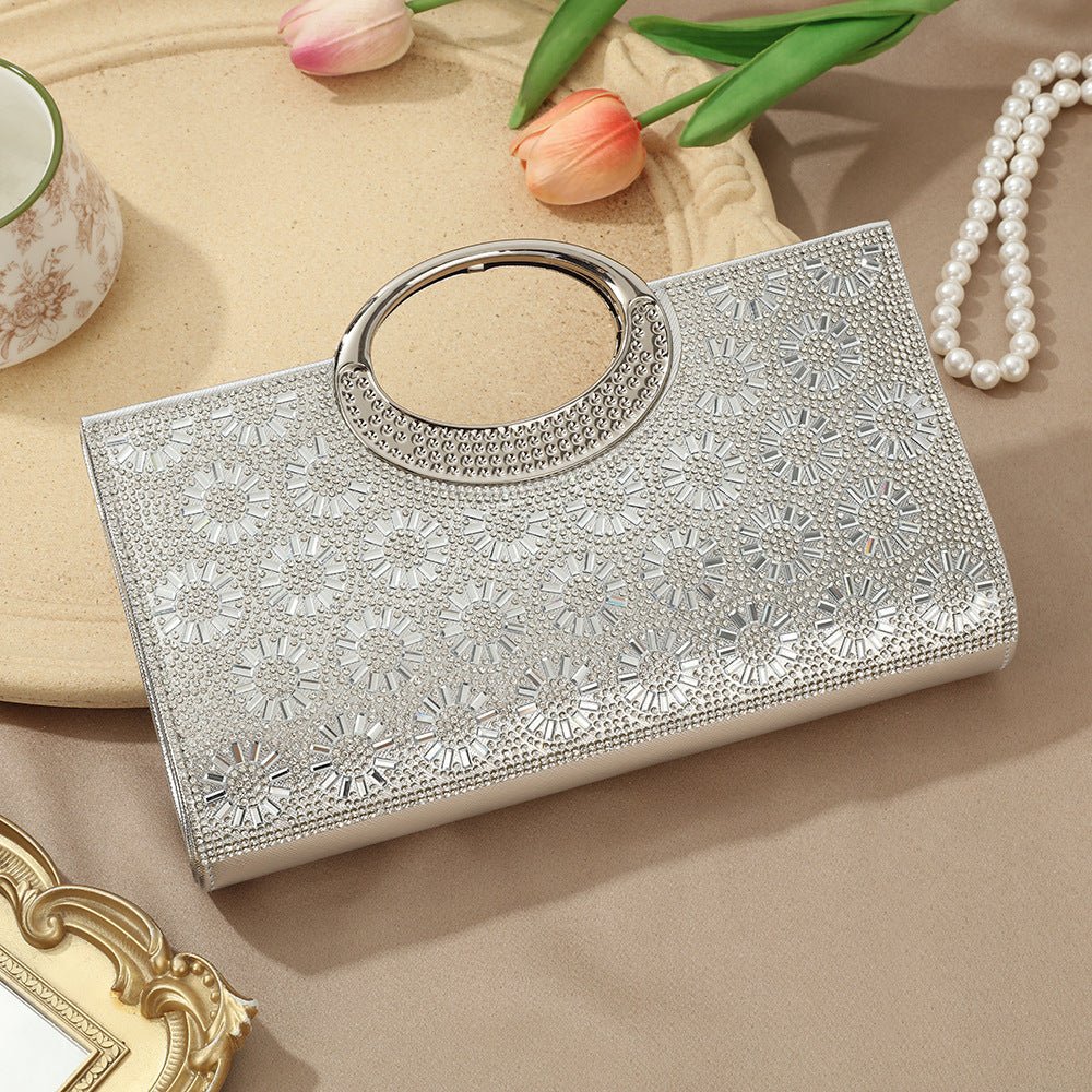 Vintage circular handle clutch bag in silver hardware finish