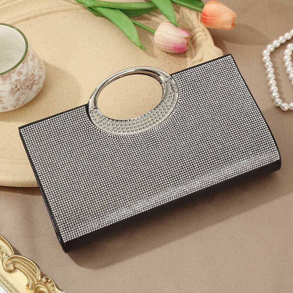 Vintage bridal clutch bag laid flat on neutral background