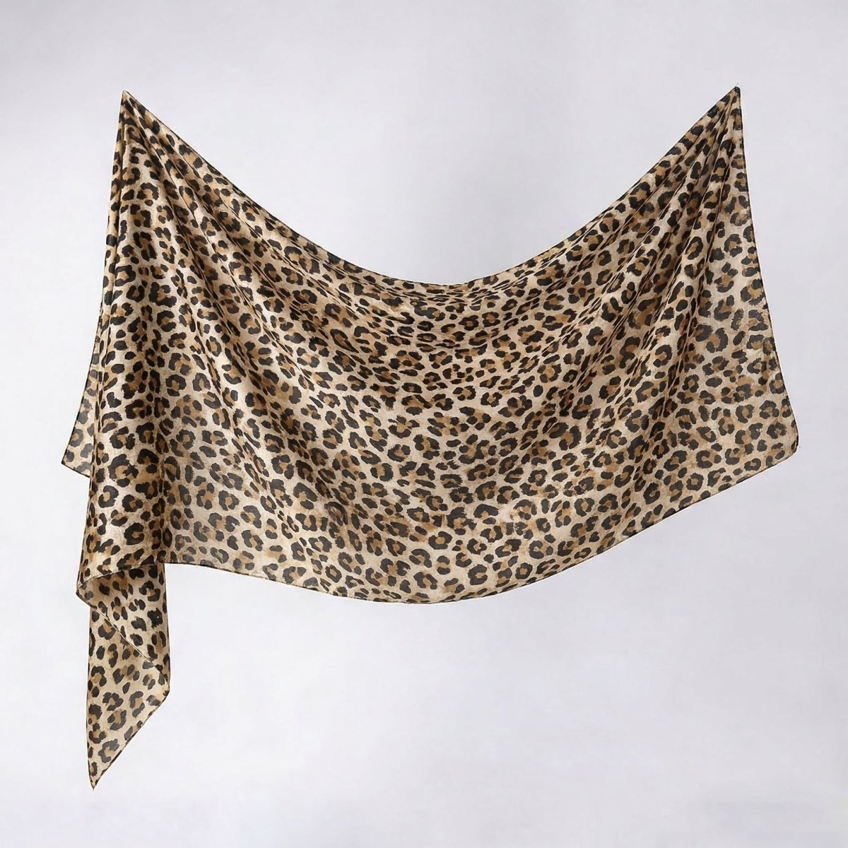 Layered wrap styling of oversized watercolour hijab shawl