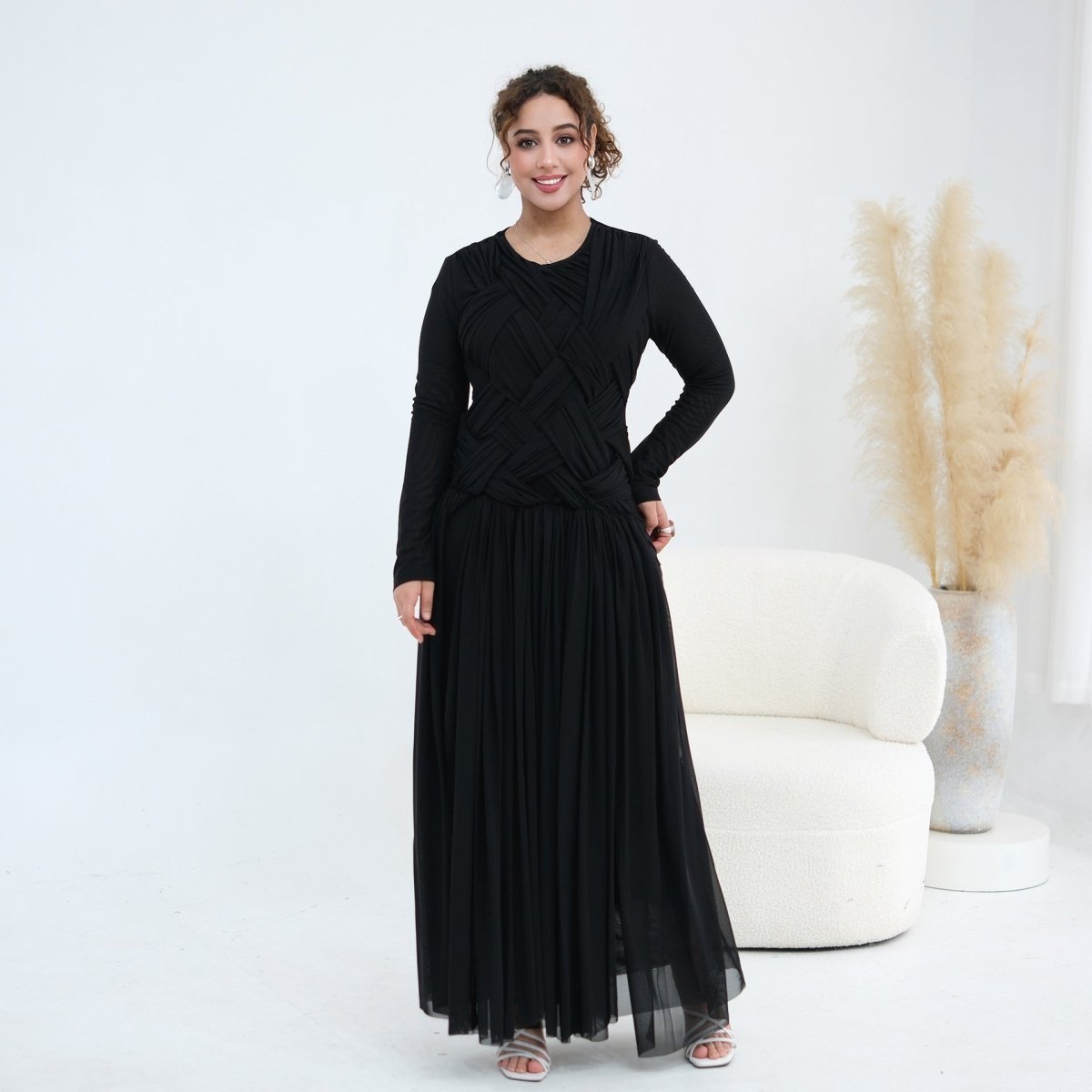 Front view of geometric diamond lattice woven bodice detail on mesh maxi dress