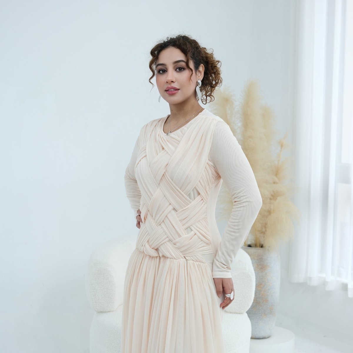 Close-up of cross-strap woven diamond lattice pattern across the bodice
