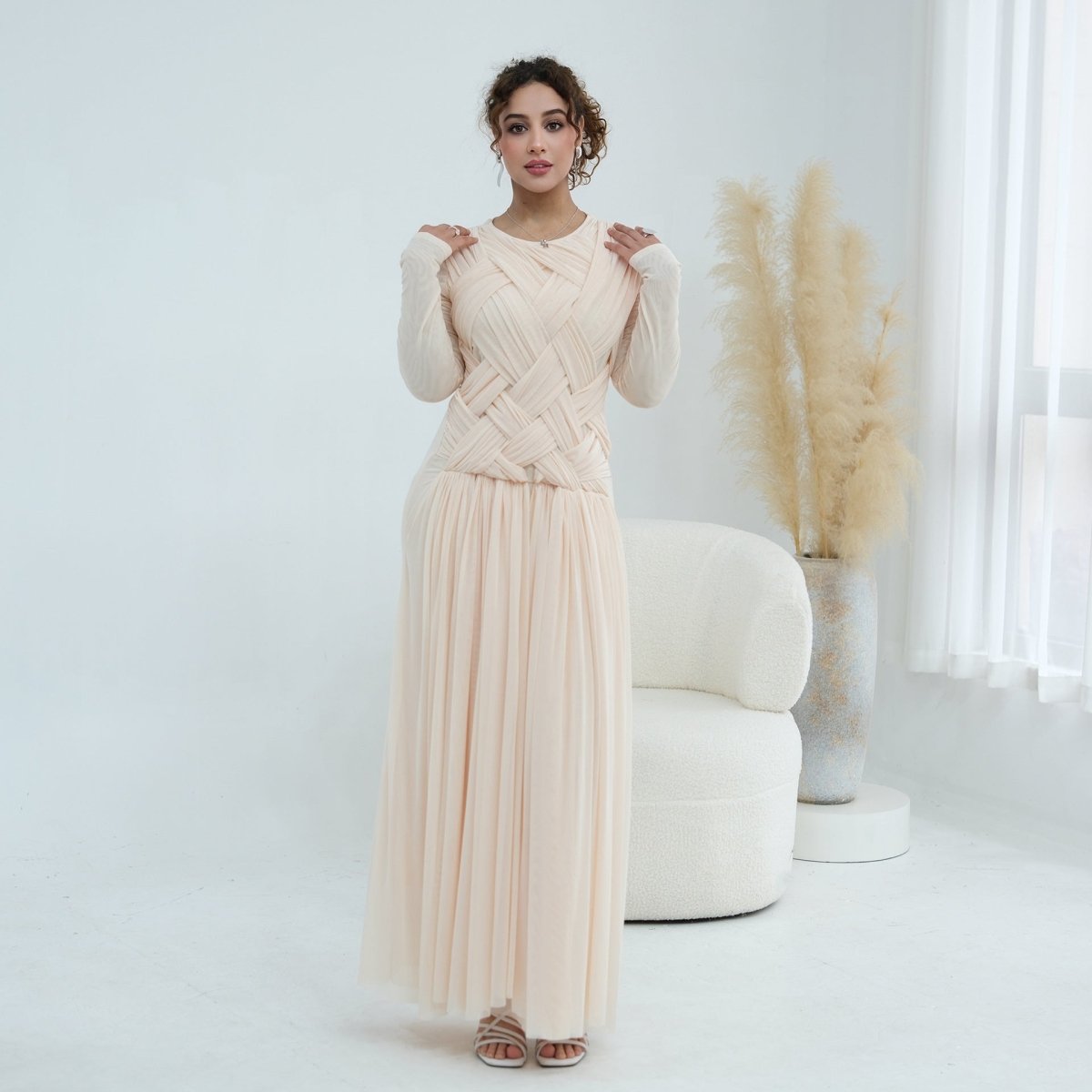 Long fitted sleeves and round neckline detail on stretch mesh maxi dress