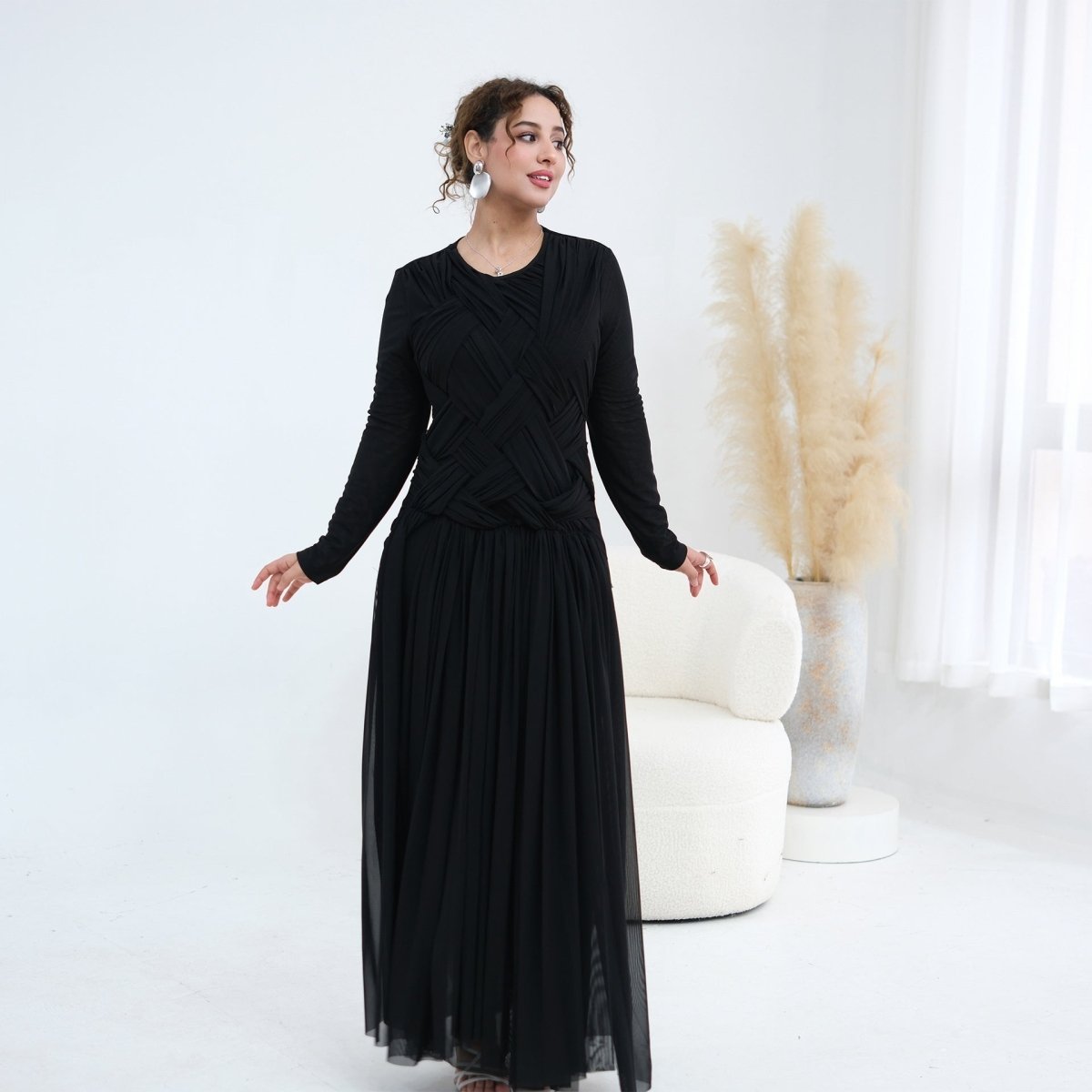 Floor-length hem of modest mesh maxi dress showing full coverage